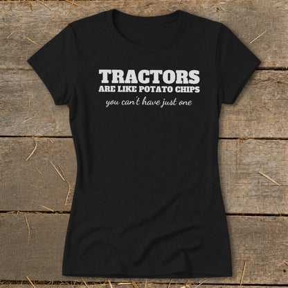 Black t-shirt with white text: "Tractors are like potato chips you can't have just one."