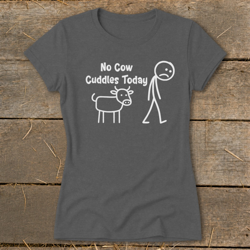 T-shirt with white text "No Cow Cuddles Today" and cartoon cow and sad stick figure.