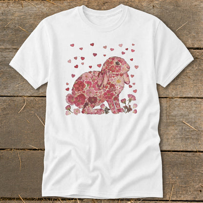 White t-shirt with a pink floral bunny and falling hearts design.