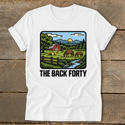 A white t-shirt featuring a retro cartoon illustration of a farm scene with horses, a barn, and the text THE BACK FORTY.
