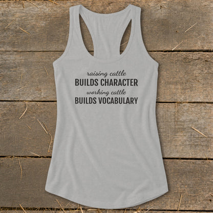 Light grey tank top with text "raising cattle BUILDS CHARACTER working cattle BUILDS VOCABULARY".