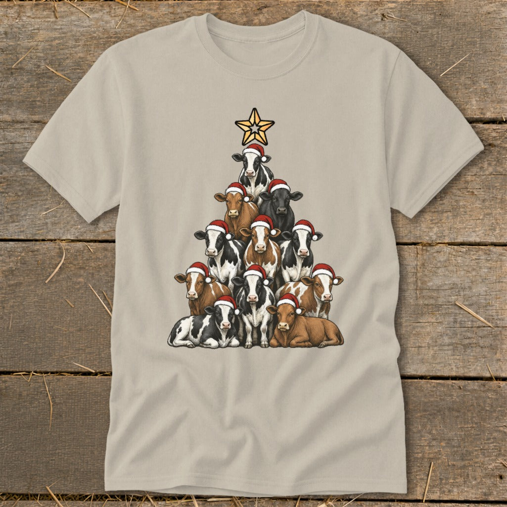 Cows wearing Santa hats arranged in a Christmas tree shape topped with a star.