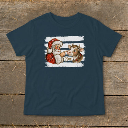 Santa boops a cow on the nose with the word "Boop" in cursive.