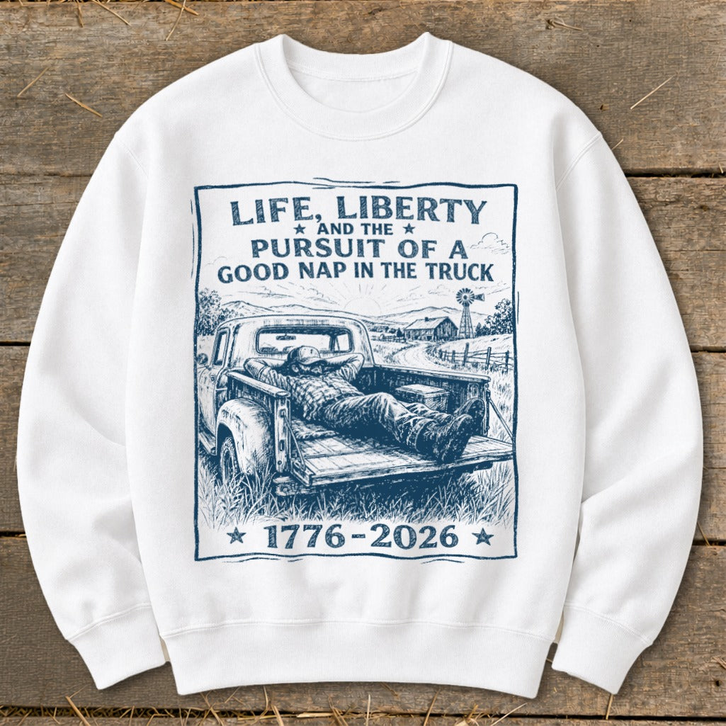 "Life, Liberty and the Pursuit of a Good Nap in the Truck" graphic with man napping in truck.