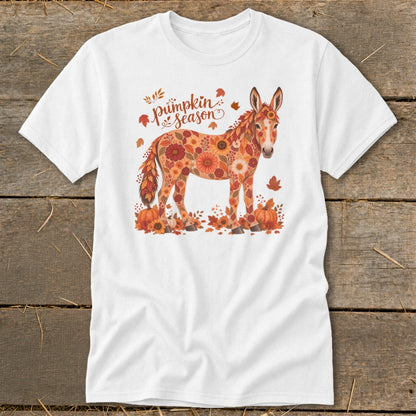 White t-shirt with a floral donkey and "pumpkin season" text.