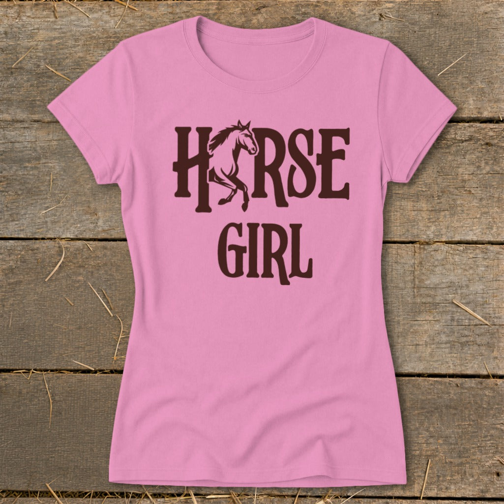Pink t-shirt with "HORSE GIRL" text and horse graphic in dark brown.