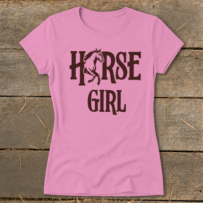 Pink t-shirt with "HORSE GIRL" text and horse graphic in dark brown.