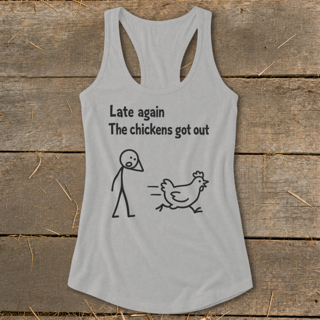 Grey tank top with black graphic: stick figure looks at running chicken and text "Late again The chickens got out".