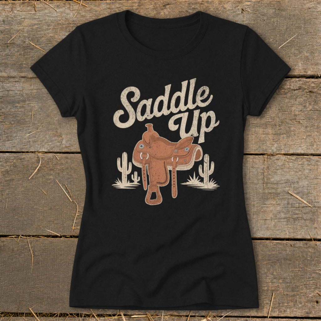 Black t-shirt with "Saddle Up" text and a western saddle graphic.