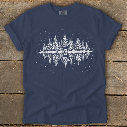 Navy t-shirt with white deer and pine trees reflected in water.