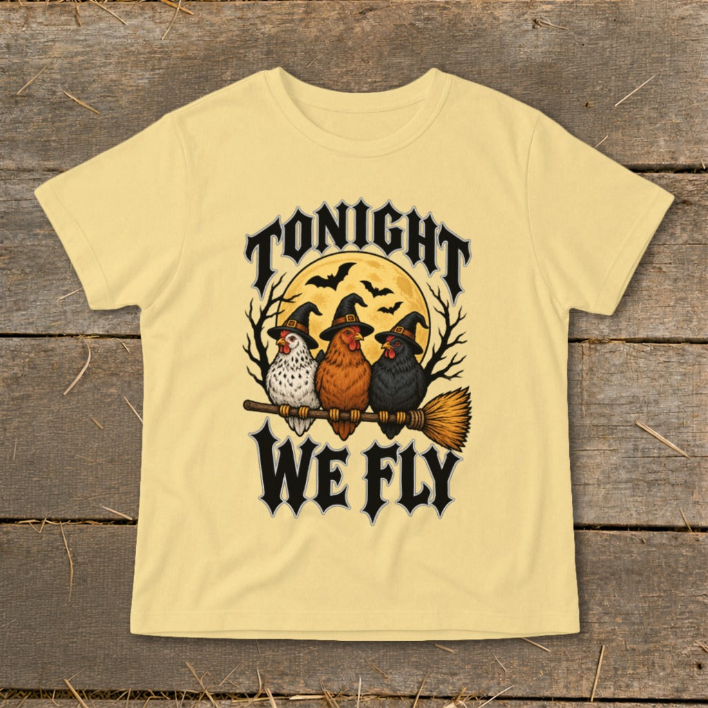 Three chickens in witch hats sit on a broom with "Tonight We Fly" text.