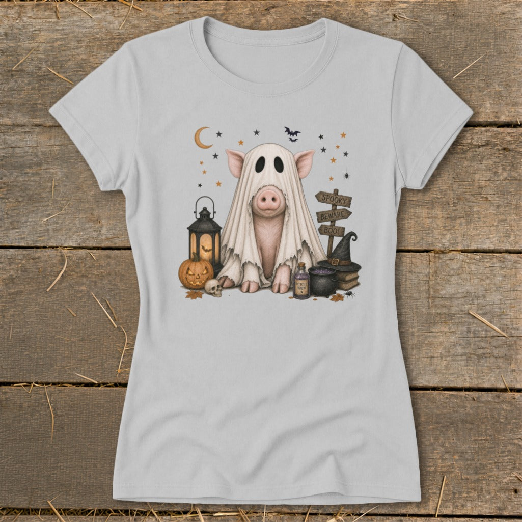 Pig in ghost costume with Halloween decorations and "Spooky Beware Boo!" sign.