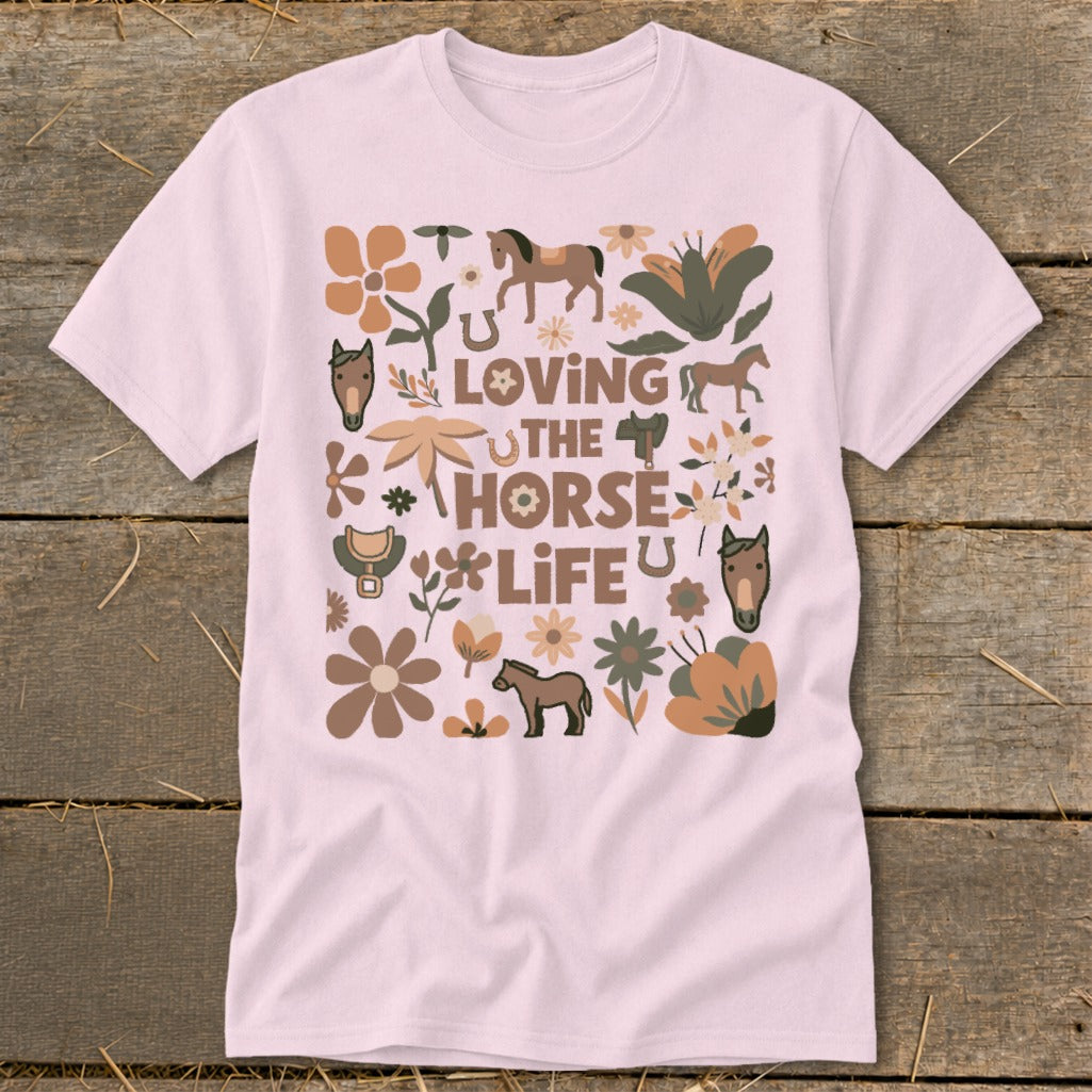 Pink t-shirt with "Loving the Horse Life" text and horse, flower, and horseshoe graphics.