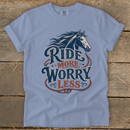 Blue t-shirt with horse graphic and "Ride More Worry Less" text.