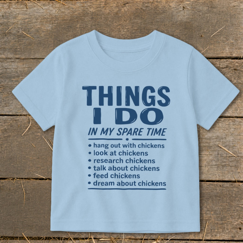 Light blue t-shirt with "Things I Do In My Spare Time" and chicken-related bullet points.