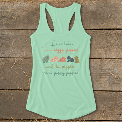 Mint tank top with cartoon pigs and text "I was like 'here piggy piggies' and the piggies here piggy piggied."