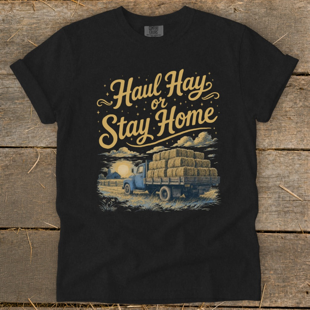 Black t-shirt with "Haul Hay or Stay Home" text and a truck loaded with hay bales.