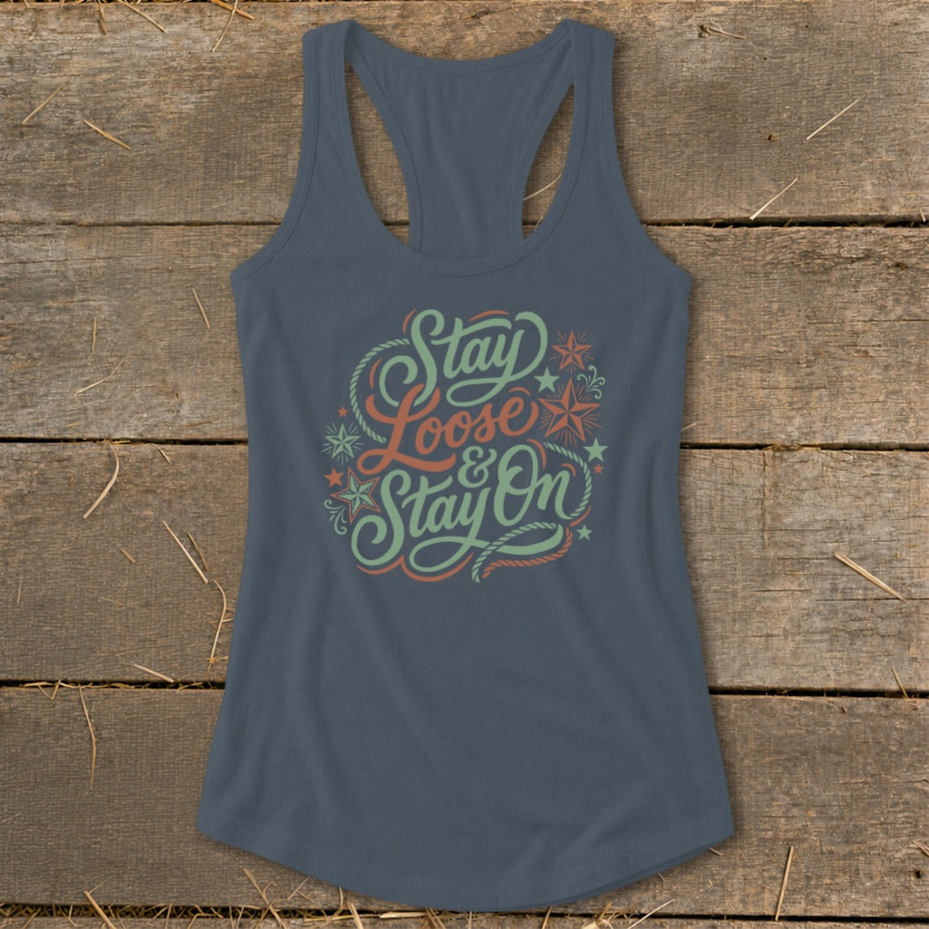 Blue tank top with "Stay Loose & Stay On" text design and decorative rope and stars.