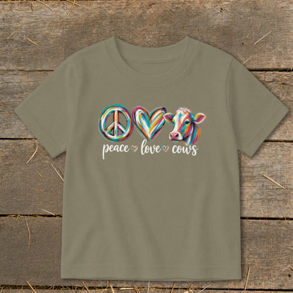 T-shirt with "peace love cows" text, peace sign, and colorful cow.