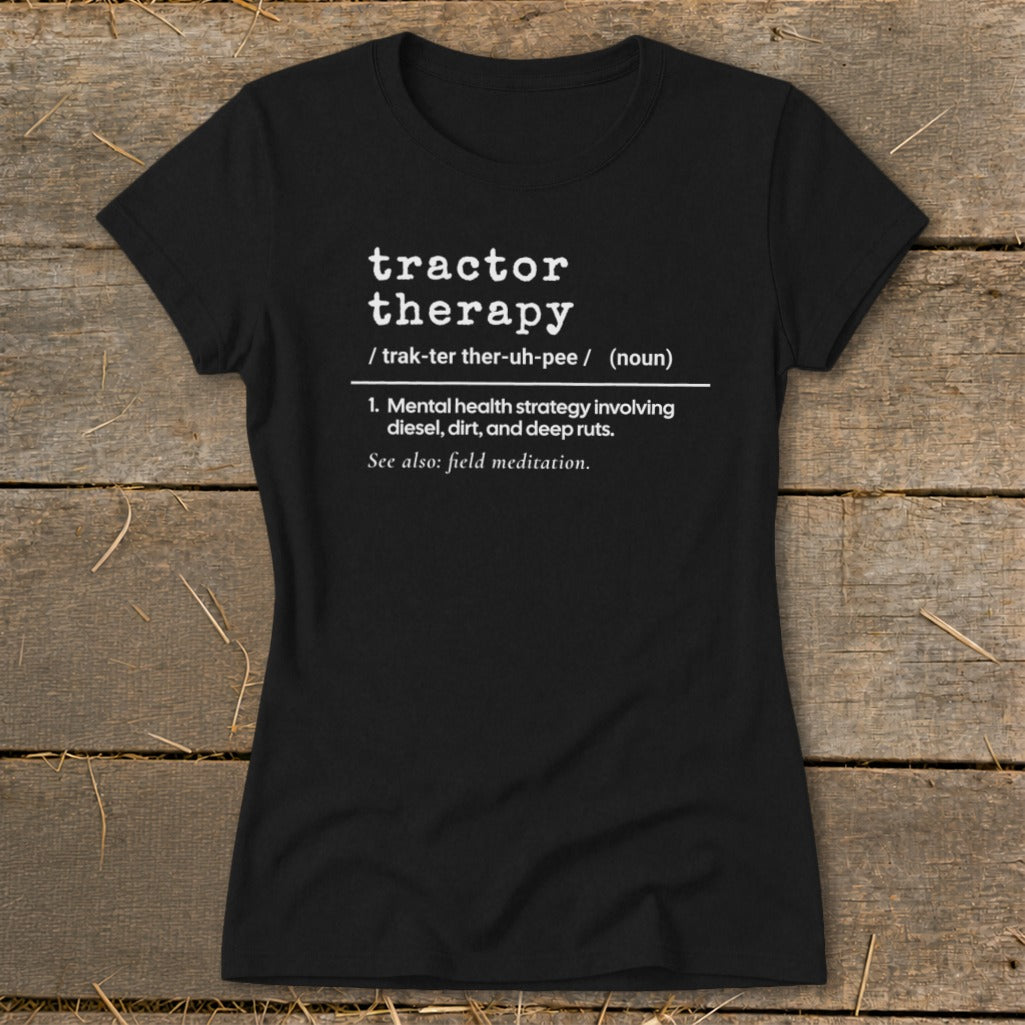 Black t-shirt with white text defining "Tractor Therapy" as a mental health strategy.