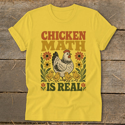 Yellow t-shirt with "Chicken Math Is Real" text and a hen with chicks graphic.
