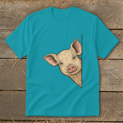 Teal t-shirt with a drawing of a pig peeking from the right edge.
