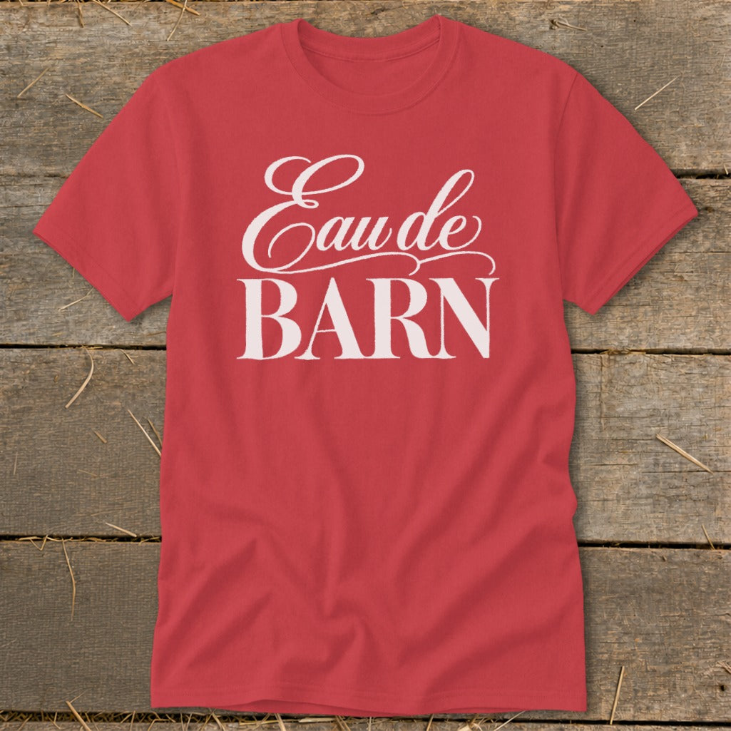 Red t-shirt with white text "Eau de BARN"
