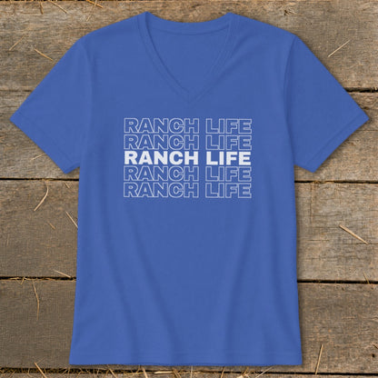 Blue V-neck t-shirt featuring stacked white outline text reading Ranch Life on a rustic wooden background.