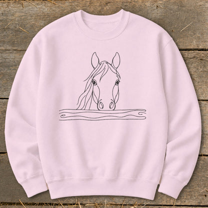 Pink sweatshirt with a black line drawing of a horse's head and mane.