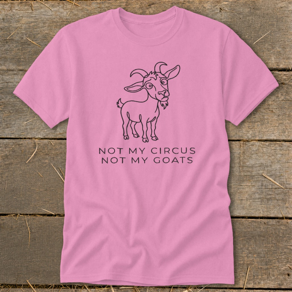 Pink t-shirt with line drawing of a goat and text "NOT MY CIRCUS NOT MY GOATS".