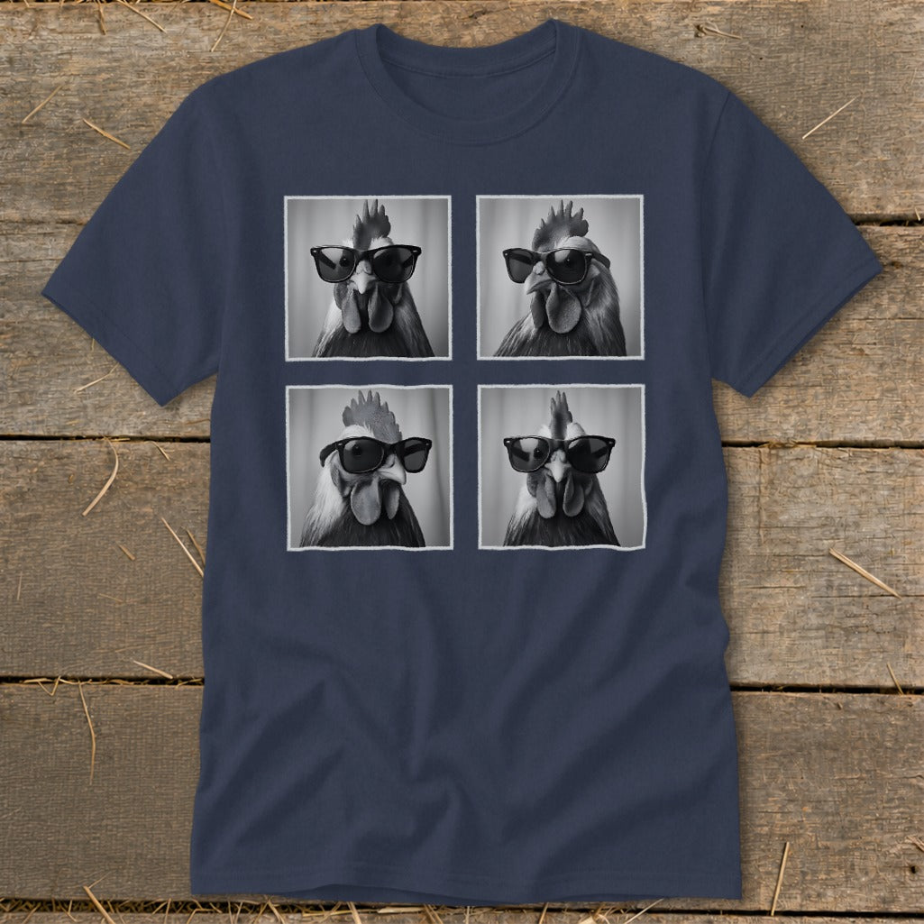 Four black and white portraits of roosters wearing sunglasses on a navy t-shirt.