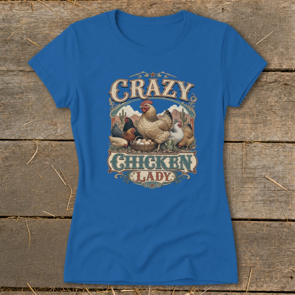 Blue t-shirt with a graphic of chickens around a basket of eggs, text reads "Crazy Chicken Lady".