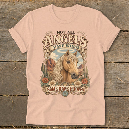 Horse with halo and desert scene graphic on a peach t-shirt with text.