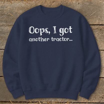 Navy sweatshirt with white text "Oops, I got another tractor..."