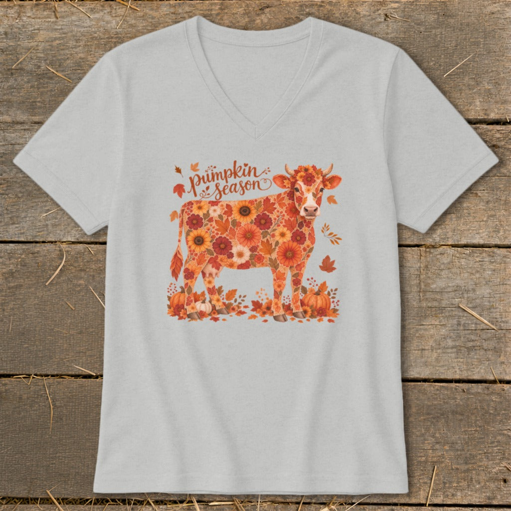 Cow graphic on t-shirt with "Pumpkin Season" text and floral autumn design.