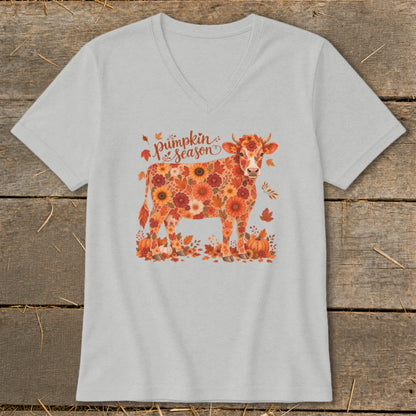 Cow graphic on t-shirt with "Pumpkin Season" text and floral autumn design.