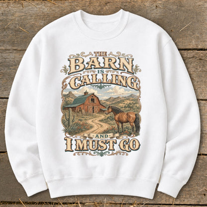White sweatshirt with graphic: "The Barn is Calling and I Must Go" and a horse.