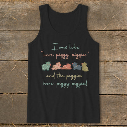 Black tank top with cartoon pigs and text: "I was like "here piggy piggies" and the piggies here piggy piggied."