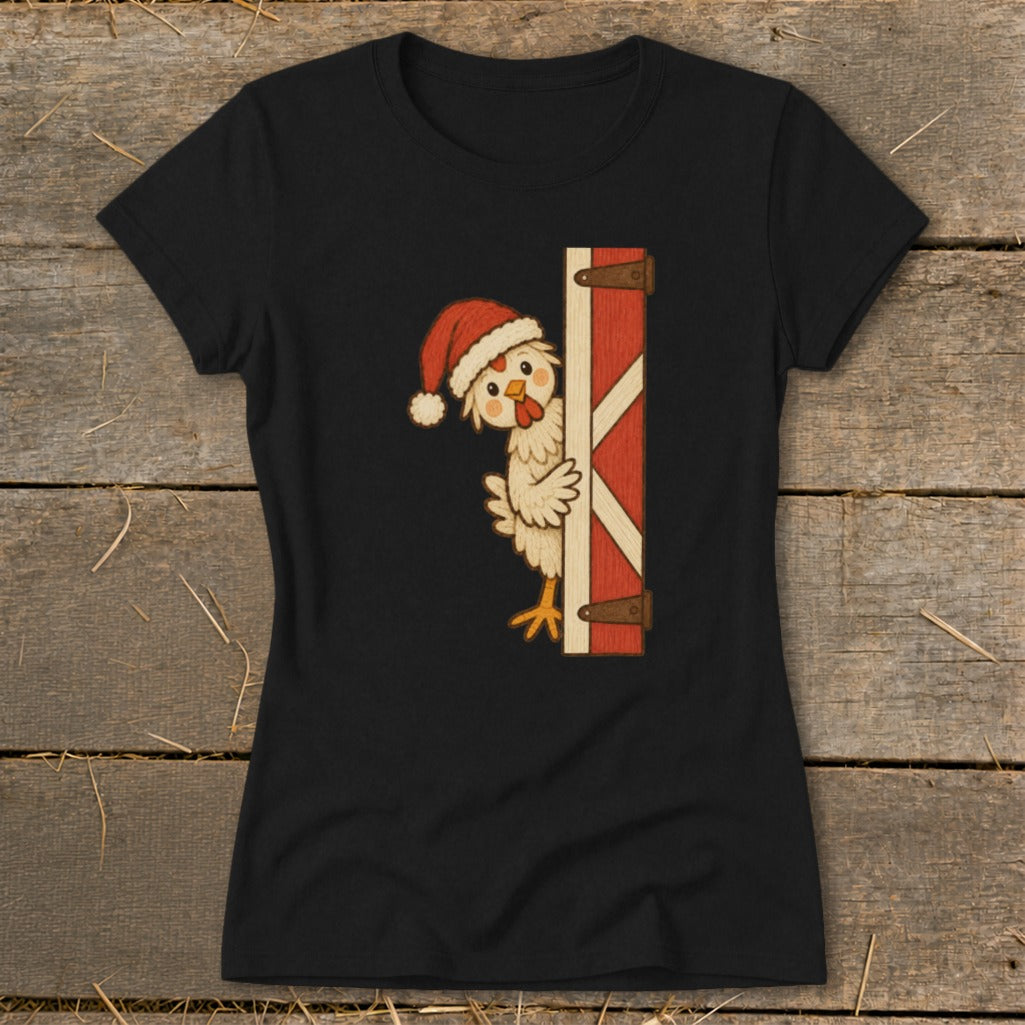 Cartoon chicken wearing a Santa hat peeking behind a red barn door.