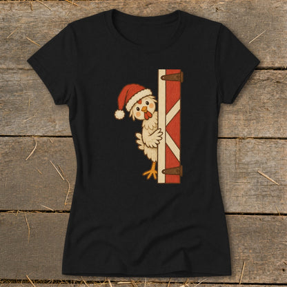 Cartoon chicken wearing a Santa hat peeking behind a red barn door.
