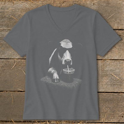 Cow wearing sunglasses and drinking from a cup with a straw.