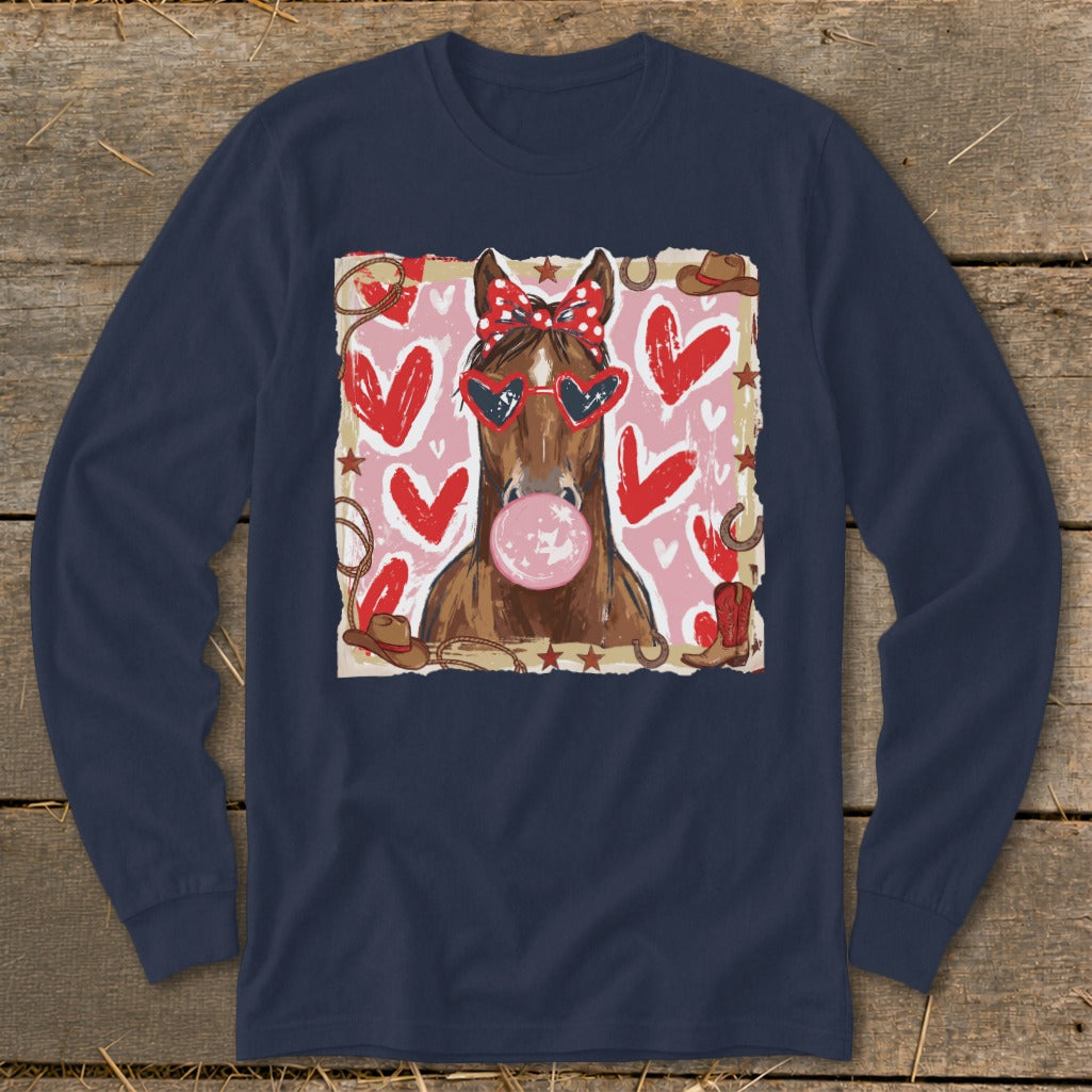 Horse wearing heart sunglasses and bandana blows pink bubblegum surrounded by Valentine's hearts.