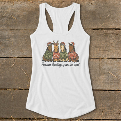White tank top with four cartoon horses in holiday sweaters and Santa hats.