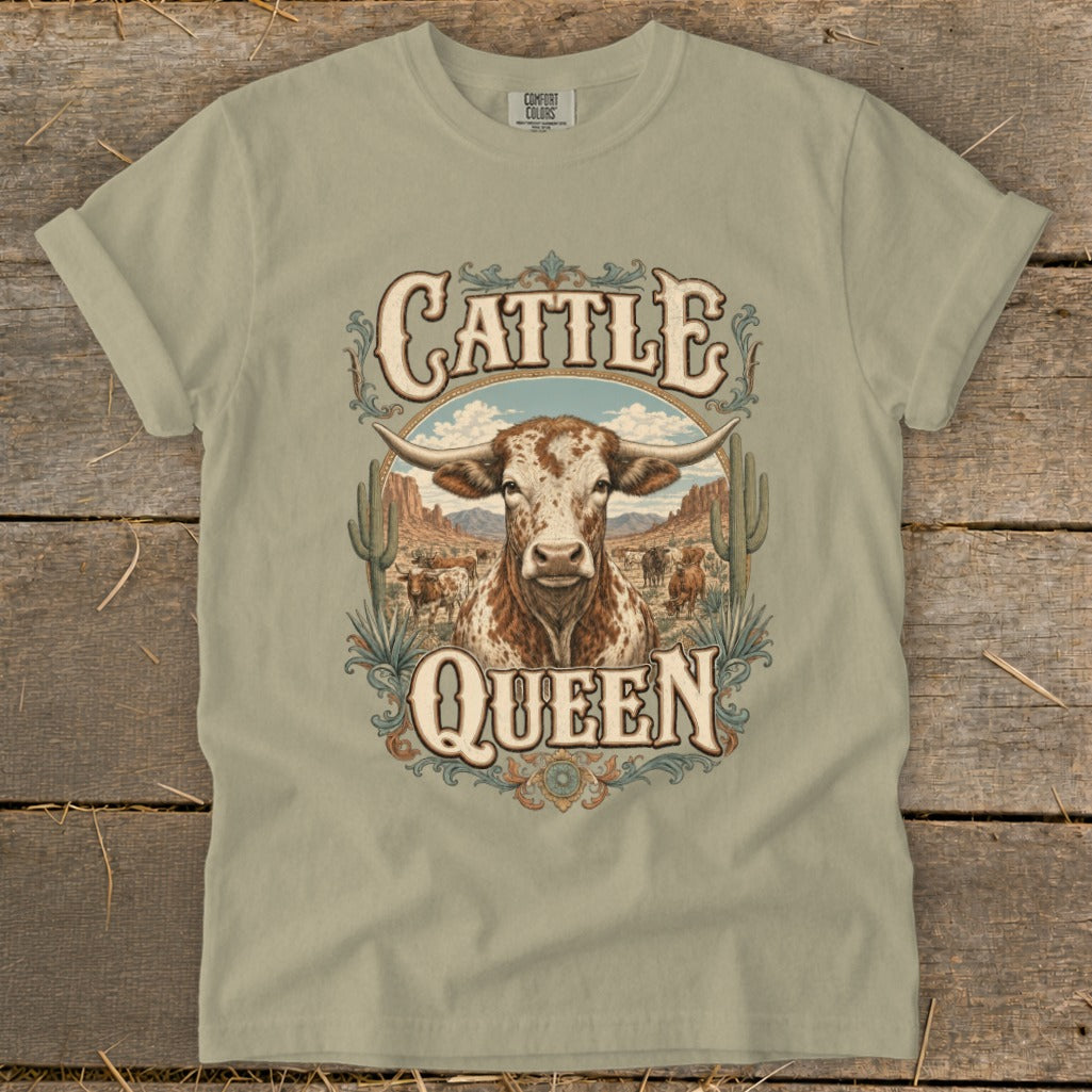 T-shirt graphic: longhorn cow with "Cattle Queen" text and desert landscape.