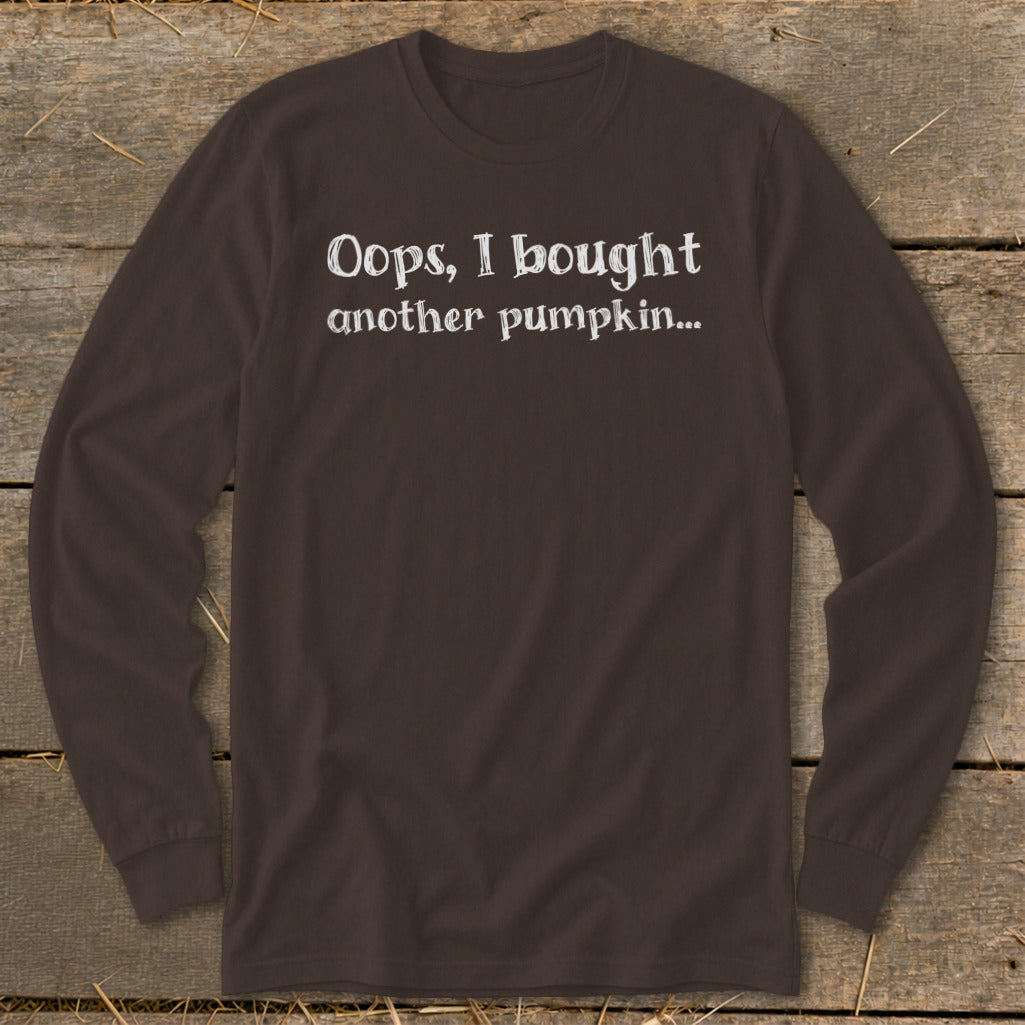 Brown long-sleeve shirt with white text: "Oops, I bought another pumpkin..."