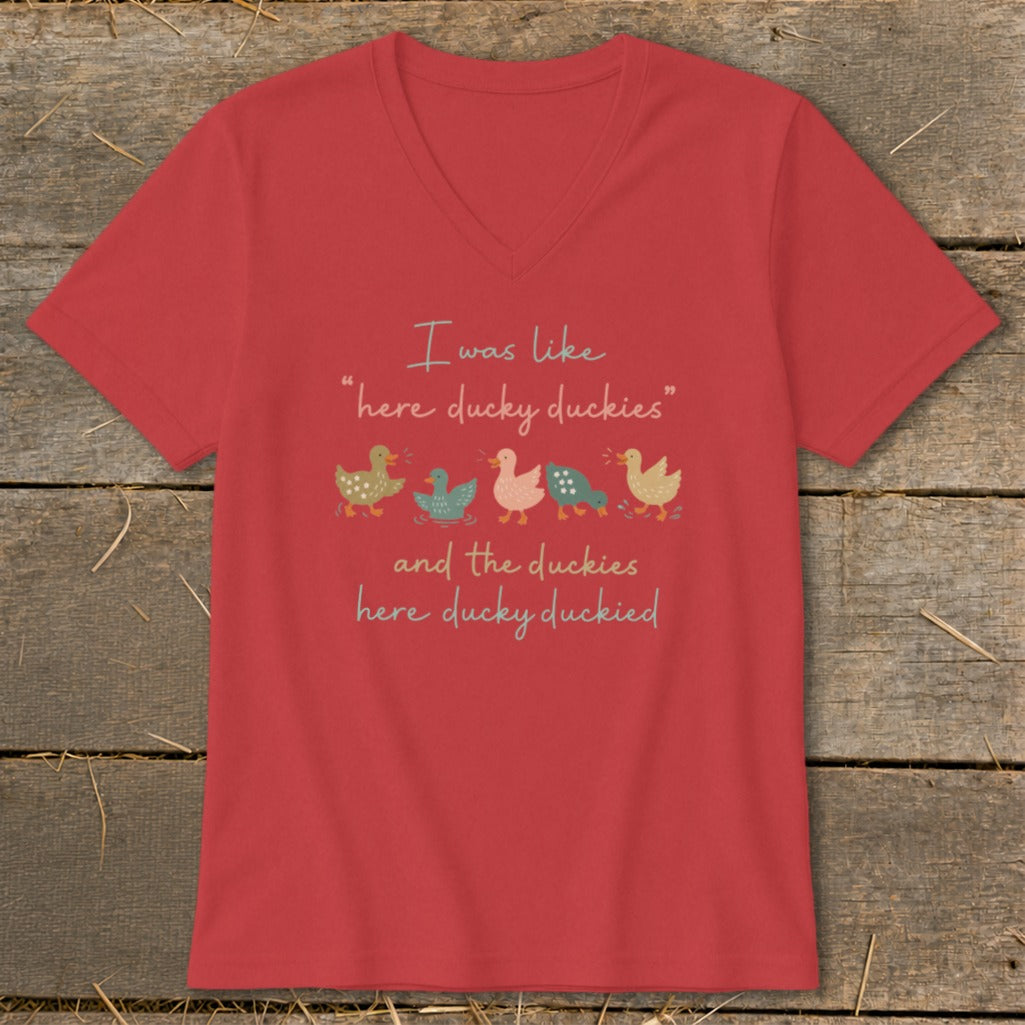 Red t-shirt with illustration of five duckies and text "I was like 'here ducky duckies' and the duckies here ducky duckied."