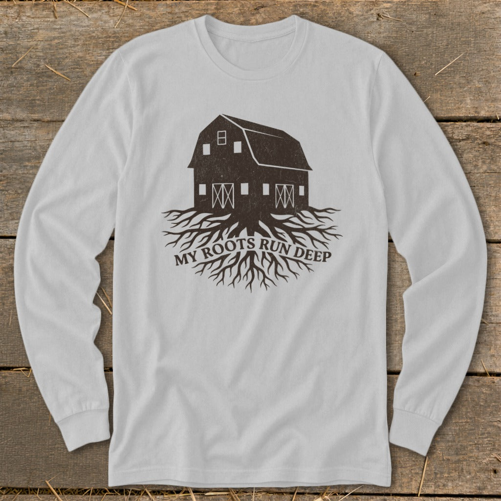 White long-sleeve t-shirt with barn and roots graphic and text "MY ROOTS RUN DEEP".