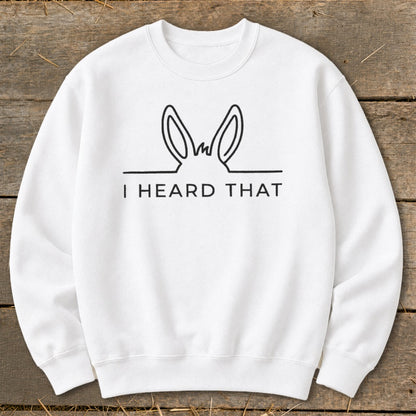 White sweatshirt with donkey ears graphic and text "I HEARD THAT."
