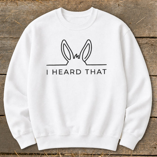White sweatshirt with donkey ears graphic and text "I HEARD THAT."