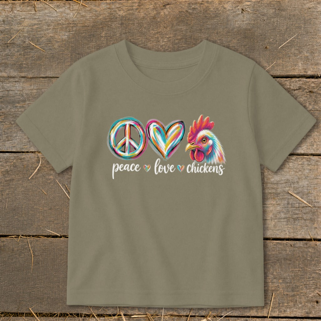 Tan t-shirt with peace, heart, and chicken graphic and text "peace love chickens".